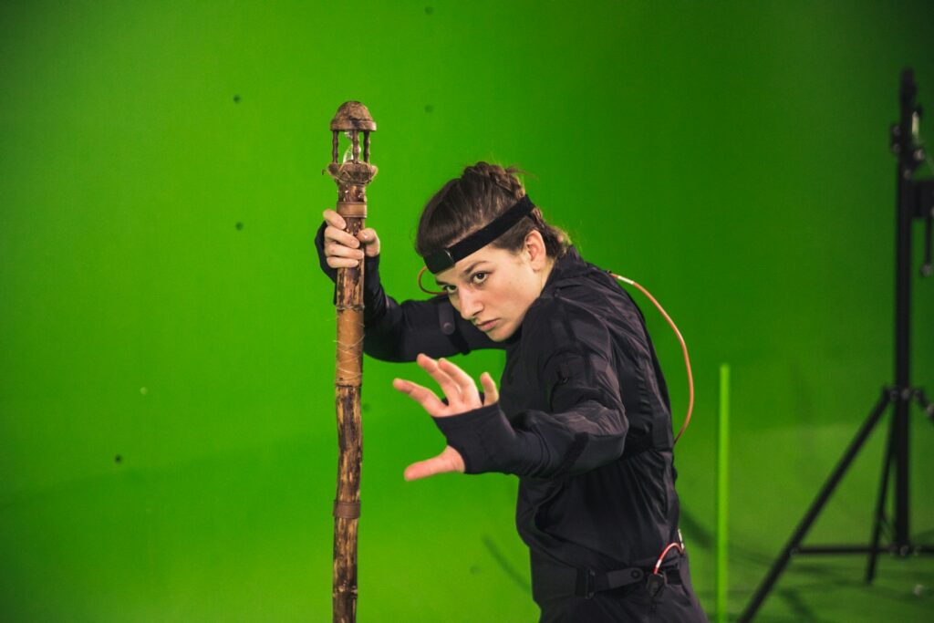 man in black jacket holding brown wooden stick - Green Screen, Greenscreen